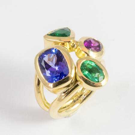 Birthstone ring with Tanzanite, Emerald and Garnet