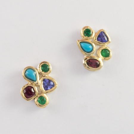 Matching birthstone earrings with Tanzanite, Emerald and Garnet