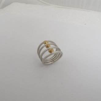 A Handmade Sterling Silver and 22ct Yellow Gold RING. Gold mass 1.0 gram