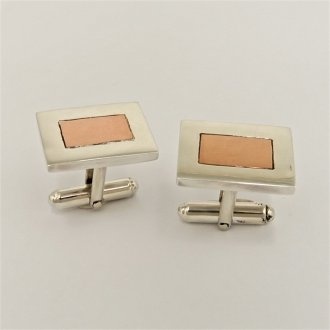 A Pair of Handmade Sterling Silver and Copper CUFFLINKS.