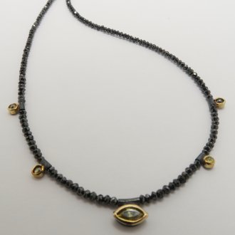 A NECKLACE of Black Diamonds (13.60cts.) with Handmade 18ct Yellow Gold, Rose-cut Diamonds (0.21ct.) and Natural Cape Marquise-cut Diamond (0.26ct.) Elements. Gold mass 0.81 gms.