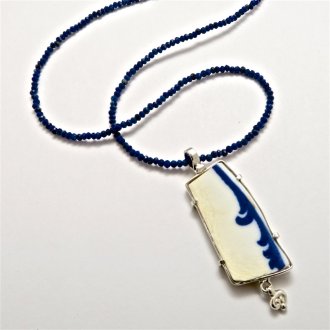A Handmade Sterling Silver and Found Porcelain PENDANT on Necklace of Lapis Lazuli.