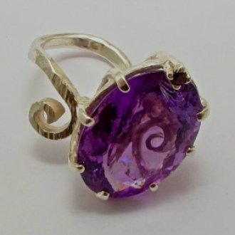A Handmade Sterling Silver RING set with Oval Amethyst (35.43cts.).