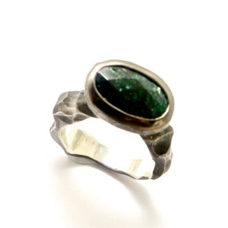 A Handmade Black Rhodium Plated Sterling Silver RING set with Green Sunsstone.