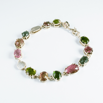 A Handmade Sterling Silver BRACELET set with Multi-coloured Tourmalines.