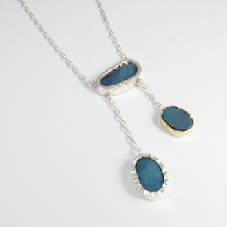 A Handmade Sterling Silver and 18ct Yellow Gold NEGLIGEE PENDANT set with Opal Doublets.