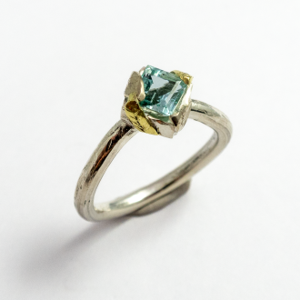 A Handmade Sterling Silver, Green and Yellow Gold RING set with Aquamarine. Gold mass 0.35 gms.