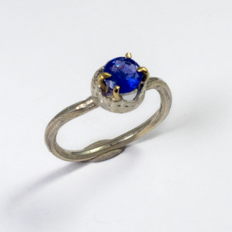 A Handmade Sterling Silver, 18ct Yellow Gold and Tanzanite (0.68cts.) RING. Gold mass 0.20 gms.