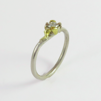 A Handmade Sterling Silver,18ct Green & White Gold RING set with Diamond. ( 0.20cts.). H; VVS2. Gold mass 0.4 gms.