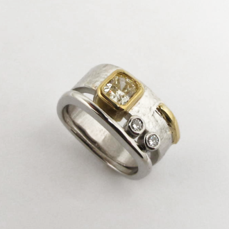 A Handmade Platinum, 18ct Yellow Gold and Diamond RING.