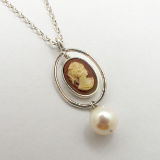 A Sterling silver and Pearl Pendant and chain created to show off this lovely little heirloom shell cameo.