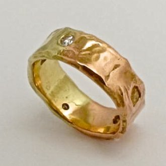 A Handmade Fine Silver, 18ct Rose Gold and 18ct Green Gold RING set with Fancy and Brilliant-cut Diamonds. Total Diamond Weight 0.57cts. Gold mass 10.76gms.