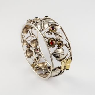 A Handmade Sterling Silver, 14ct Yellow Gold ad Garnet "Butterfly in the Daisy Patch" BANGLE. 