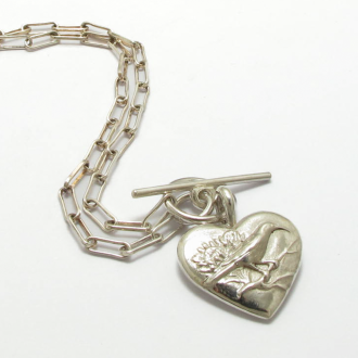 A Handmade "Sunbird and Protea" PENDANT on Silver Chain.