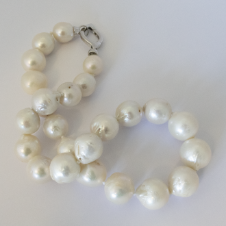 A NECKLACE of XXL White Freshwater Pearls on Sterling Silver Clasp.