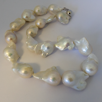 A NECKLACE of XXXL White Baroque Freshwater Pearls on Sterling Silver Clasp.