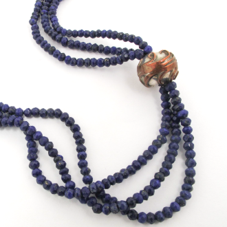 A NECKLACE of Lapis Lazuli Beads on Handmade Sterling Silver and Copper Ball Element