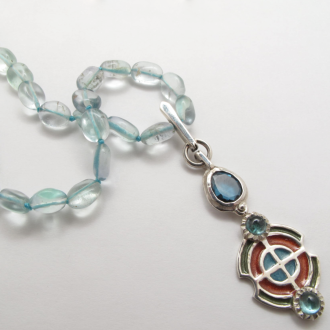 A Handmade Sterling Silver, Enamel, Aquamarine and Tourmaline PENDANT on Fluorite Beads.