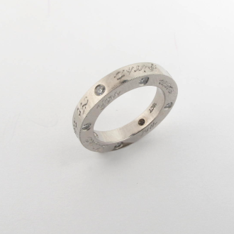 A Handmade Platinum and Diamond Commitment RING.