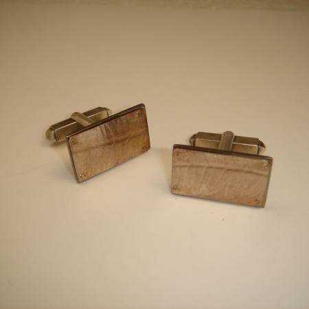 A Pair of Handmade Sterling Silver Roll Printed and Rivetted FERN CUFFLINKS.