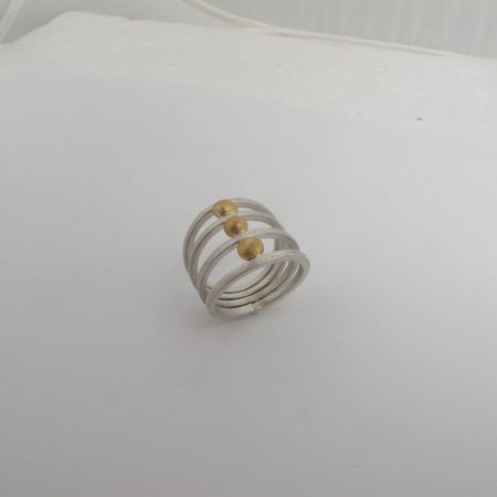 A Handmade Sterling Silver and 22ct Yellow Gold RING. Gold mass 1.0 gram