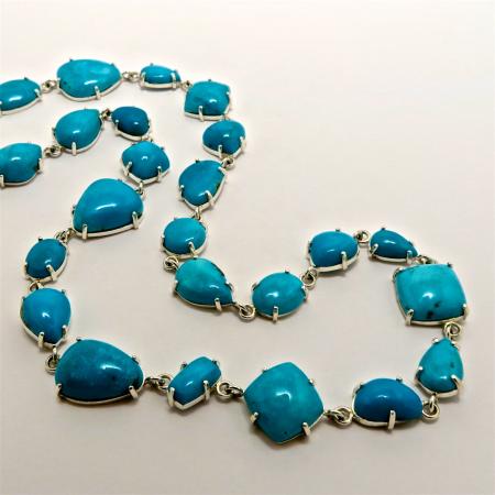 A Handmade Sterling Silver and Arizona Turquoise NECKLACE.