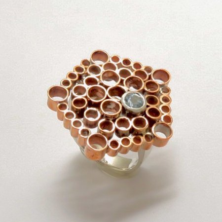 A Handmade Sterling Silver and Copper RING set with Aquamarine.