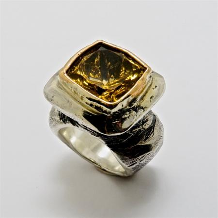 A Handmade Sterling Silver and 18ct Yellow Gold RING set with Cushion-cut Citrine. Gold mass 2.6 gms.