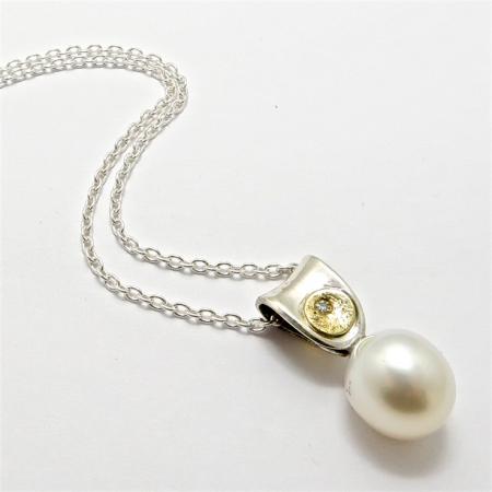 A Handmade Sterling Silver, 18ct Yellow Gold, Diamond (.015ct.) and Tahitian Pearl PENDANT on Silver Chain.