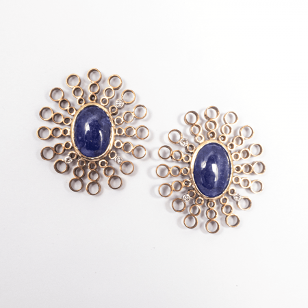A Pair of Handmade Sterling Silver and Copper STUD EARRINGS set with Tanzanite (18.37cts.) and Diamonds (0.10cts.).