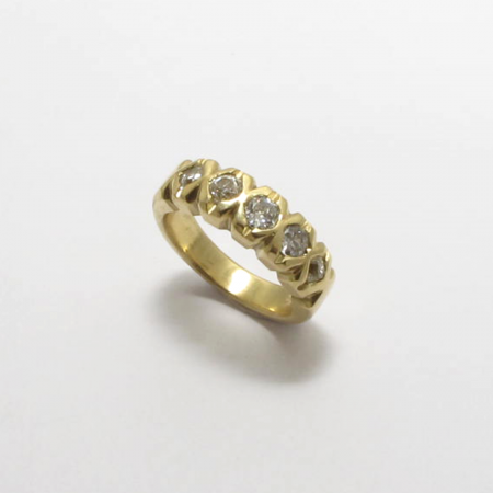 A Handmade 18ct Yellow Gold RING set with 5 Old-cut Diamonds. (Total Diamond Weight 1.06cts.). Gold mass 12.5 gms.