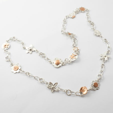 A Handmade Sterling Silver and Copper DAISY CHAIN NECKLACE.