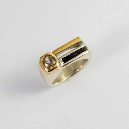 A Handmade Sterling Silver and 18ct Yellow Gold RING set with Old Mine-cut Diamond and Black Diamond Squares.