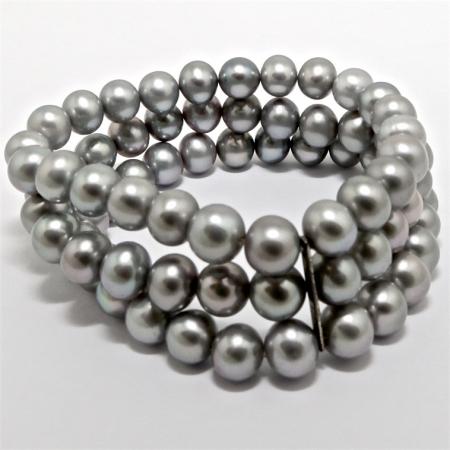 A BRACELET of Off-Round Grey Freshwater Pearls with Sterling Silver Bar.