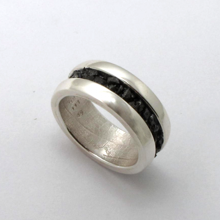A Handmade Sterling Silver RING with Black Industrial Diamonds.