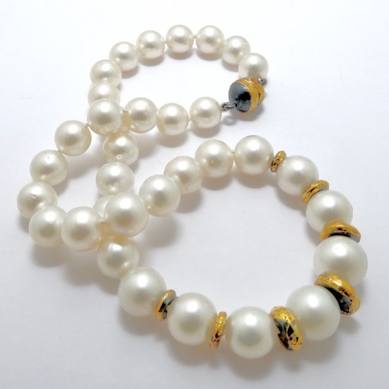 A NECKLACE of South Sea Pearls with Handmade Sterling Silver and Fine Gold Elements and Clasp. Gold mass 2.3 gms.