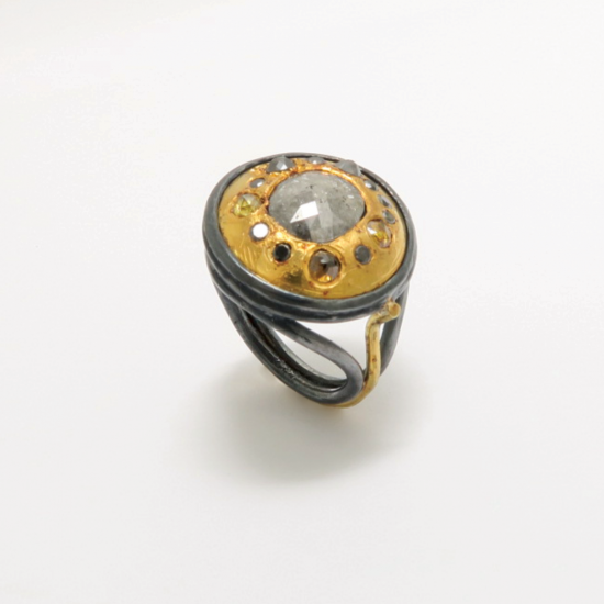A Handmade Sterling Silver and Fine Gold RING set with Natural Rose-cut and Black Diamonds.