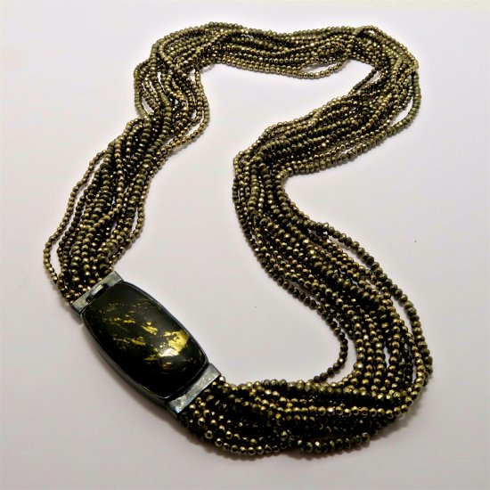 A NECKLACE of Assorted Iron Pyrite (Fool's Gold) with Handmade Sterling Silver and Apache Gold Clasp.