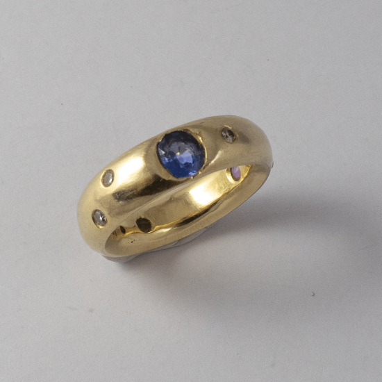 A Handmade 18ct Rose Gold RIng set with Blue, Yellow and Pink Sapphire and Diamonds.