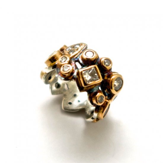 A Handmade Sterling Silver and 18ct Yellow Gold RING set with Diamonds. Gold mass 6.4 gms