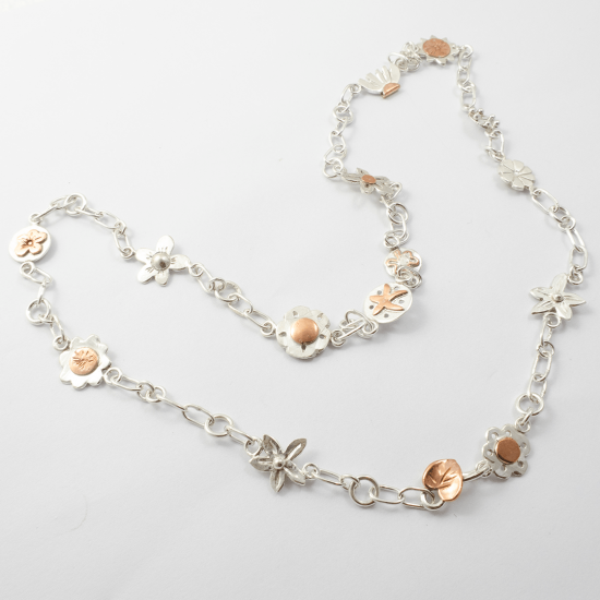 A Handmade Sterling Silver and Copper DAISY CHAIN NECKLACE.