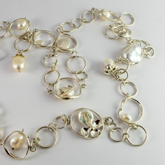 A Handmade Sterling Silver Fancy Link NECKLACE with Assorted Freshwater Pearls.