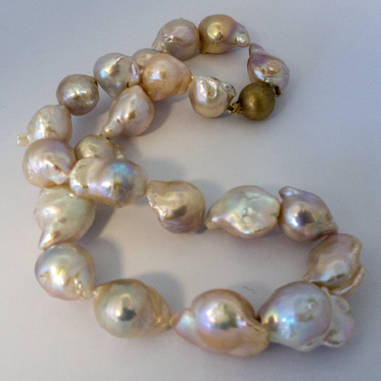 A NECKLACE of Natural Baroque Freshwater Pearls on 9ct Yellow Gold Clasp.
