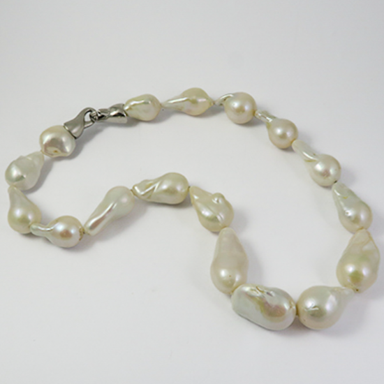 A NECKLACE of XL Baroque Freshwater Pearls on Silver Clasp.