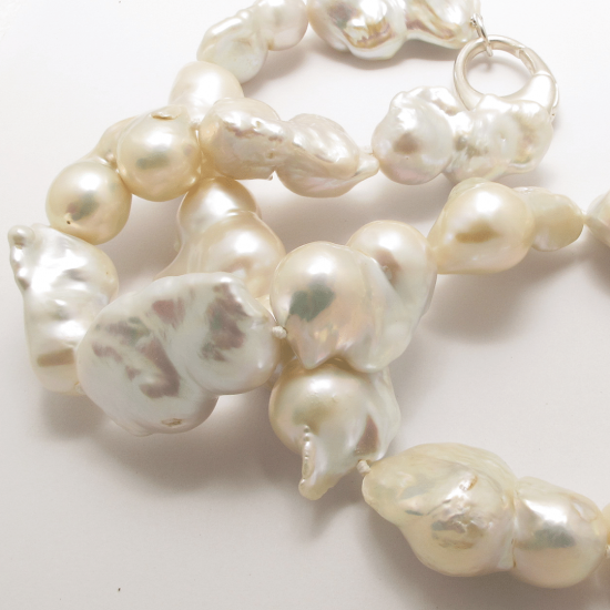 A Necklace of Baroque Freshwater Pearls on Silver Clasp.