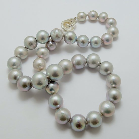 A NECKLACE of Round Grey Freshwater Pearls on Sterling Silver Clasp.11-14.5 mm in Diameter.