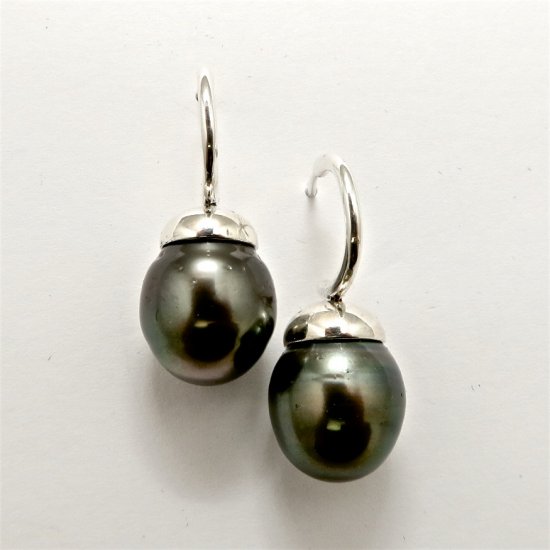 A Pair of DROP EARRINGS with Tear-shaped Tahitian Pearls.