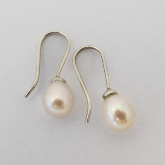 A Pair of Sterling Silver and White Freshwater Pearl DROP EARRINGS.