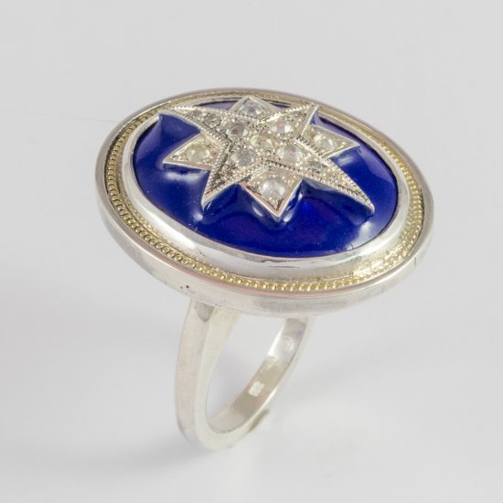 A Handmade Sterling Silver, 18ct Yellow Gold and Blue Enamel STAR RING set with Rose-cut  and Round Brilliant-cut Diamonds.