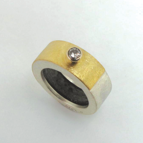 A Handmade Sterling Silver,18ct Yellow Gold and Diamond.